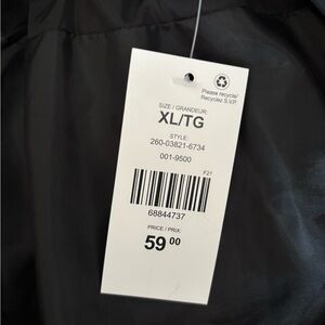 Ladies extra large puffer jacket new with tags.